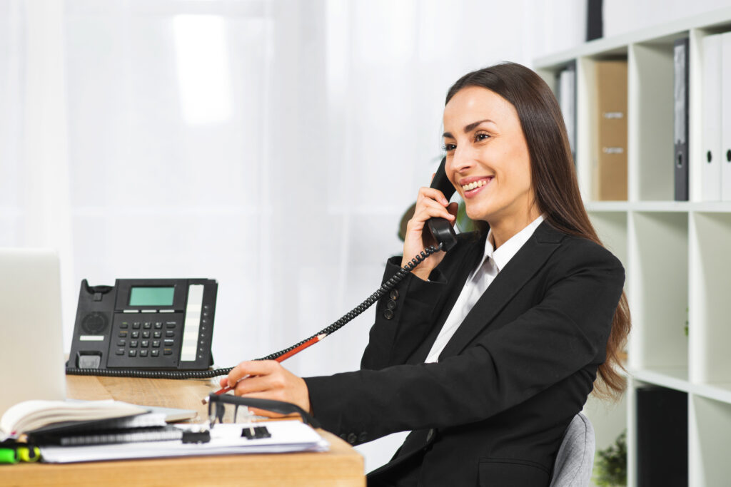 Young Businesswoman Smiling While Talking Telephone Office 1024x683